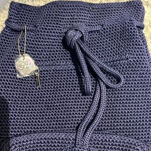 NWOT The Sak Navy Hand-Crochet Bag. Nice zip up pocket on outside.Navy Blue.